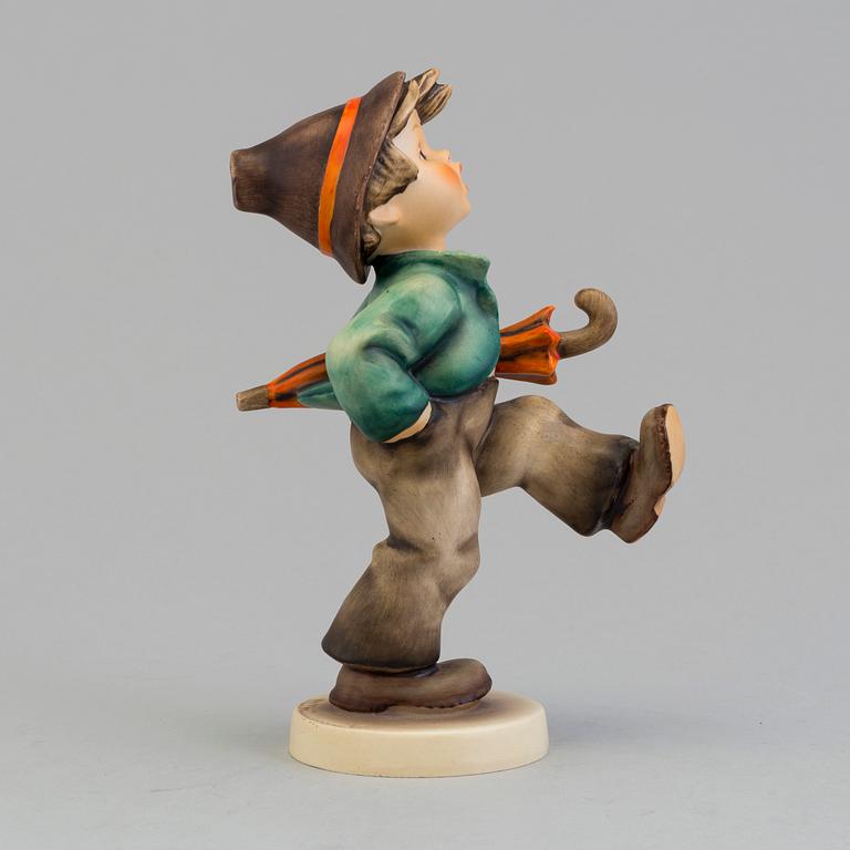 A Hummel porcelain figurine from Goebel, West Germany.