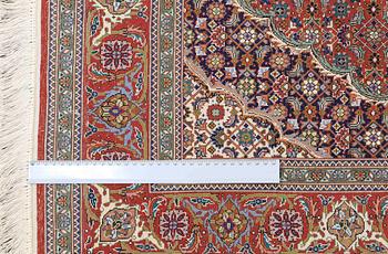 A carpet Tabriz, part silk , so called 50 Radj, ca 160 x 104 cm.