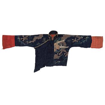 1196. A rare fragment of a silk four clawed 'dragon' jacket, late Ming dynasty/early Qing dynasty.