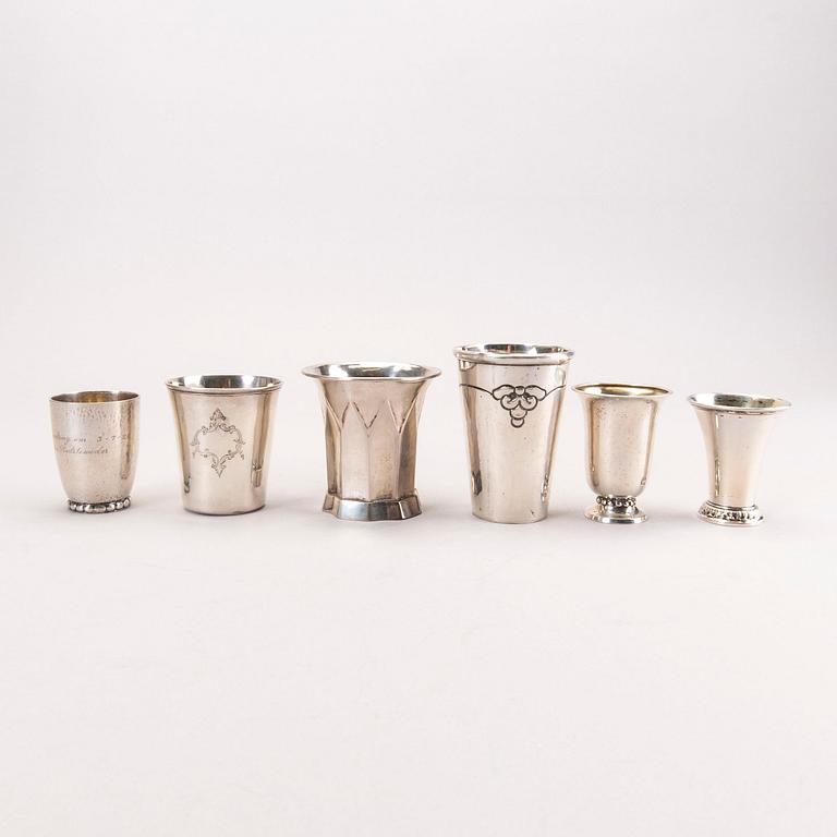 Six 20th century, miniature beakers, silver, makers of Georg Jensen, Lachmann and others.