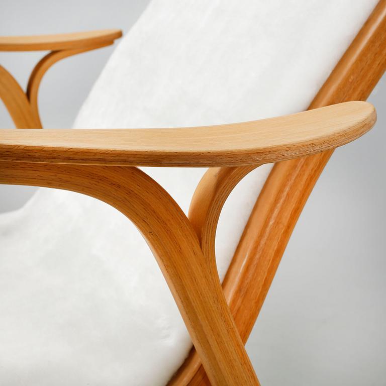 A pair of lounge chairs by Yngve Ekström for Swedese, second half of the 20th century.