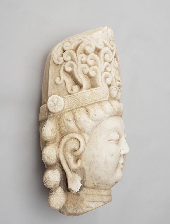 A white stone 20th century buddha head.