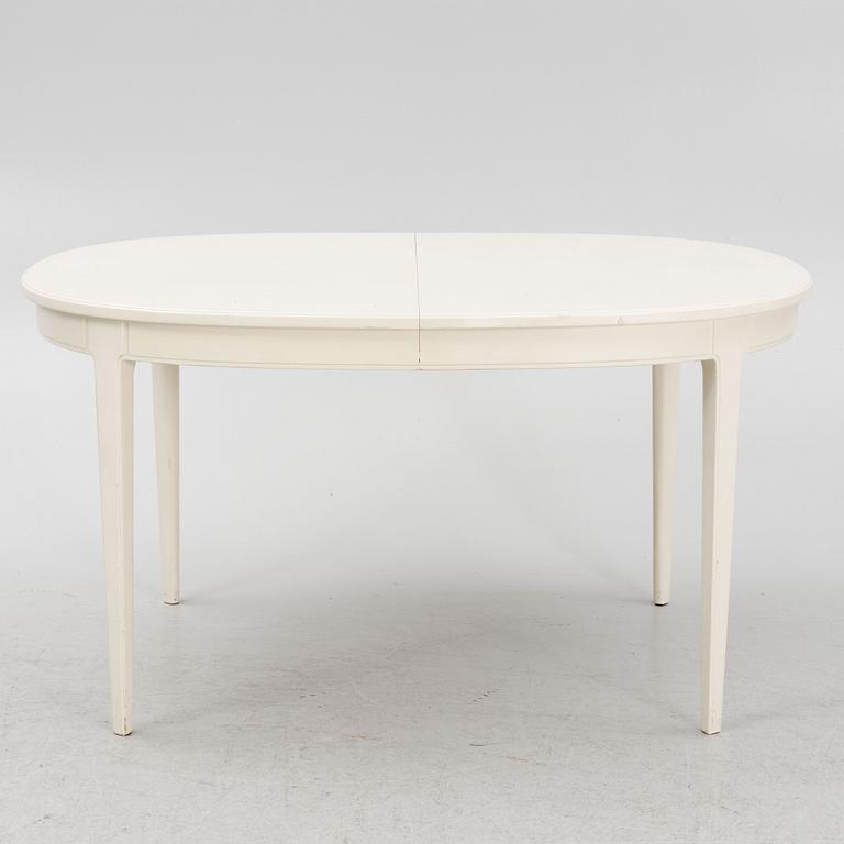 Carl Malmsten, a 'Herrgården' dining table with two extra leaves.