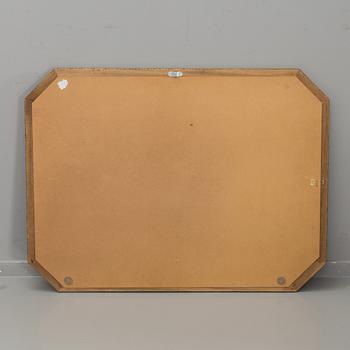 A WALL MIRROR MADE IN SPAIN.