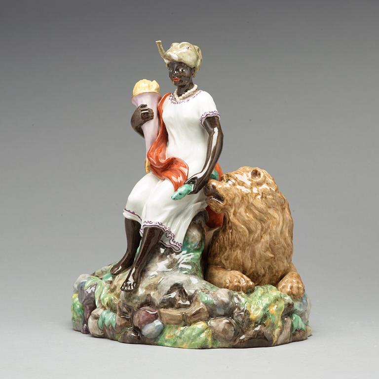 A Royal Copenhagen allegorical figure group of Africa, Denmark, early 20th Century.