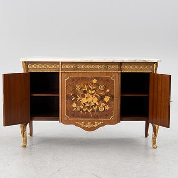 A chest of drawers, Louis XVI style, mid 20th Century.