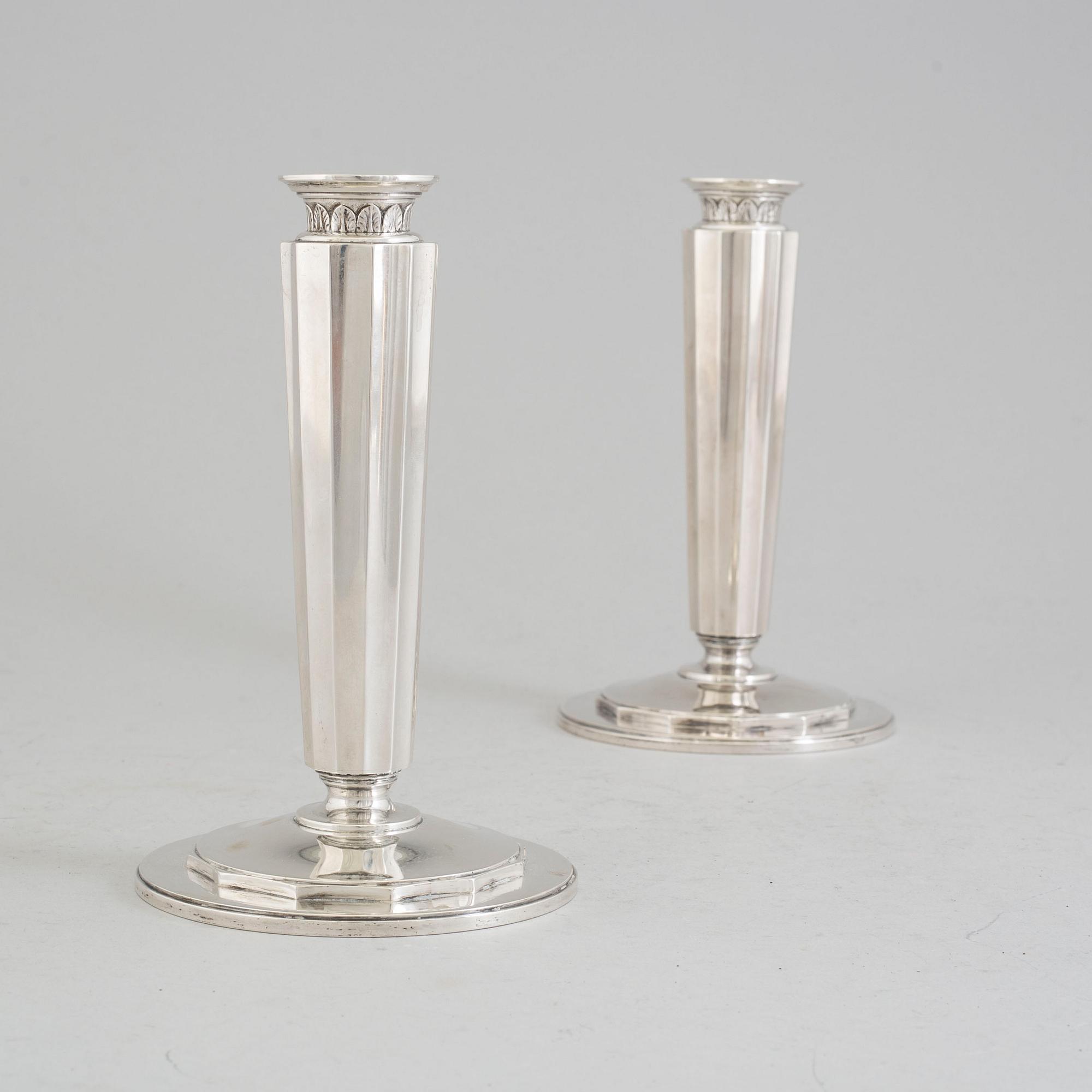 A pair of sterling silver candle sticks by Atelier Borgila. Stockholm 1956.