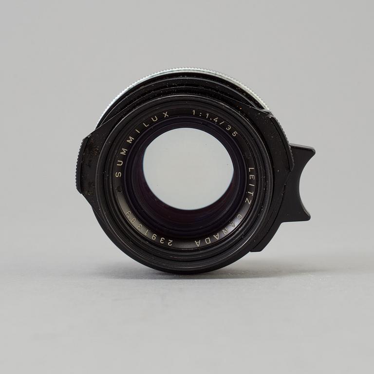 A black Leica Summilux 1:1.4 /35 Leitz  Lens no 2391303, Canada.