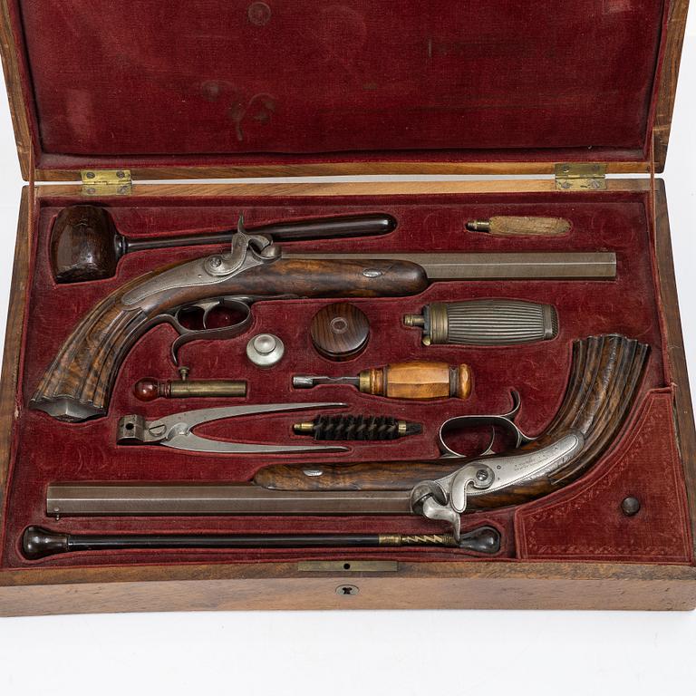 A cased pair of percussion pistols by Pondevaux & Jussy, S.Etienne (1845-1880), France.