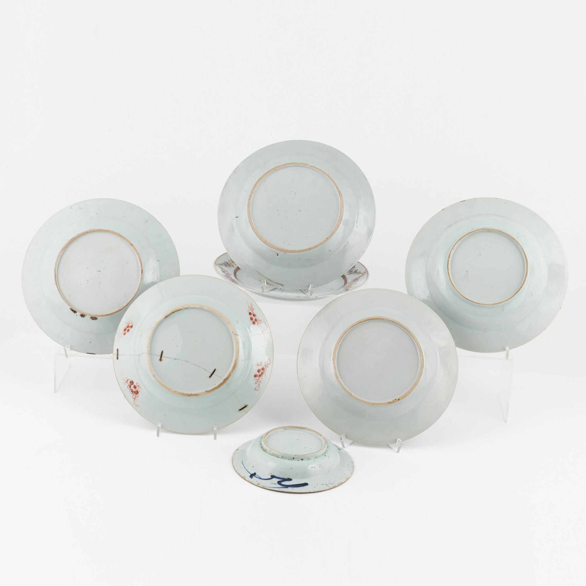 Six Famille Rose plates, and a blue and white dessert dish, China, 18th century.