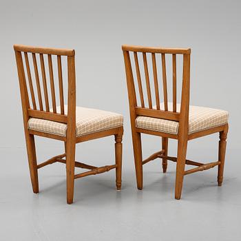 A pair of gustavian chairs, early 19th century.
