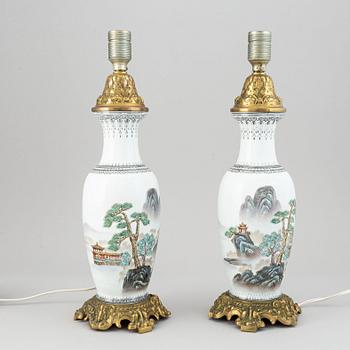 A pair of bronze mounted table lamps, China, second half of the 20th Century.
