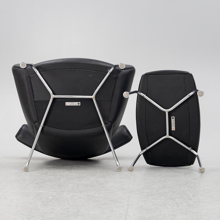 Hans J. Wegner, fåtölj med fotpall, "Ox Chair", EJ-100, Erik Jørgensen Møbelfabrik A/S, Svendborg, Danmark.