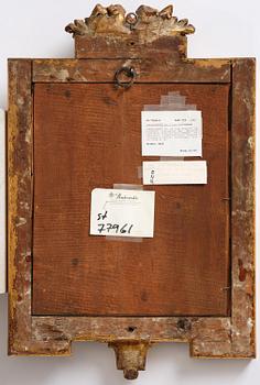 A Gustavian giltwood two-light girandole mirror by J. Åkerblad (master in Stockholm 1754-99).