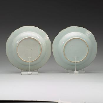 A pair of famille rose 'double peacock' dishes, Qing dynasty, Qianlong (1736-1795).