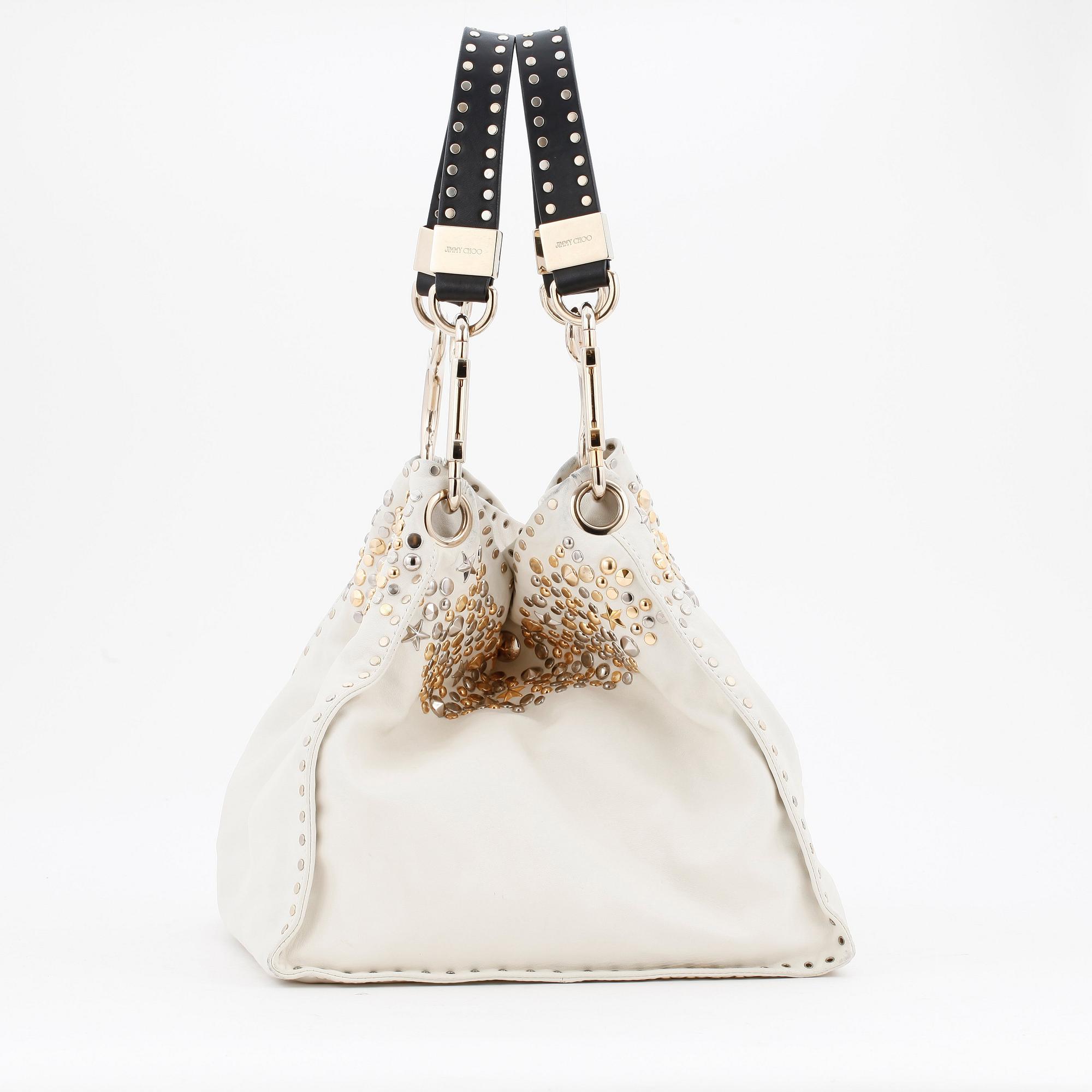 JIMMY CHOO, a white leather handbag with studs.