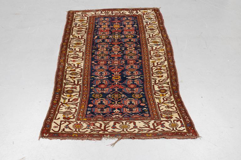 A rug, antique Kurdish, ca 247-253 x 116-125 cm.