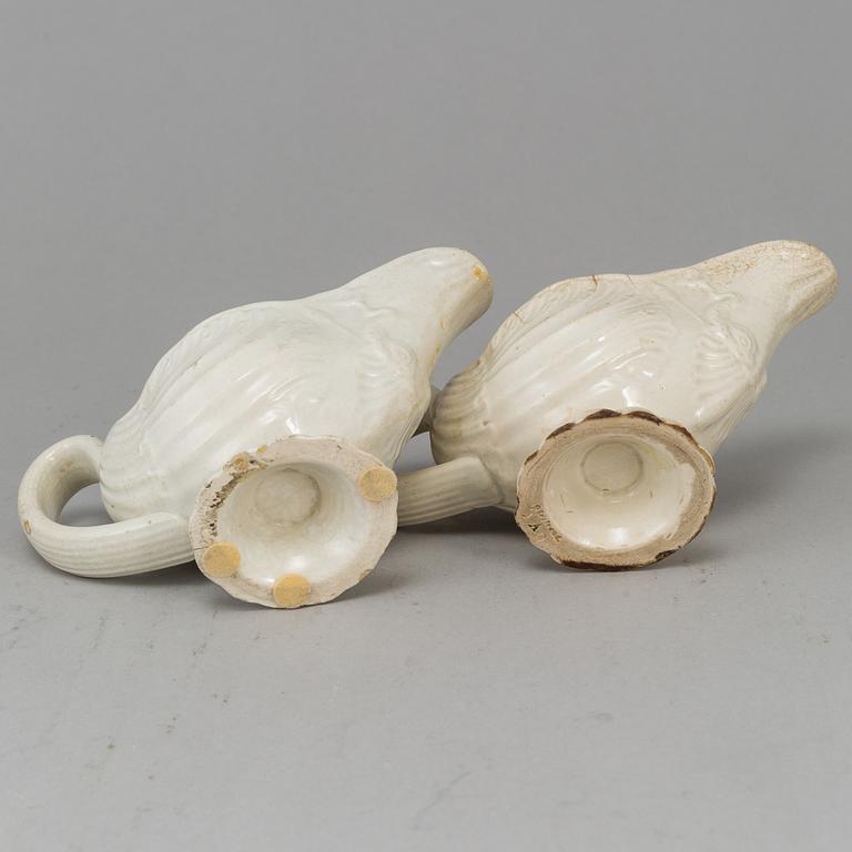 A creame weare buttertureen with cover, a cake mould and a pair of sauce boats, 18/19th Century, part Rörstrand.