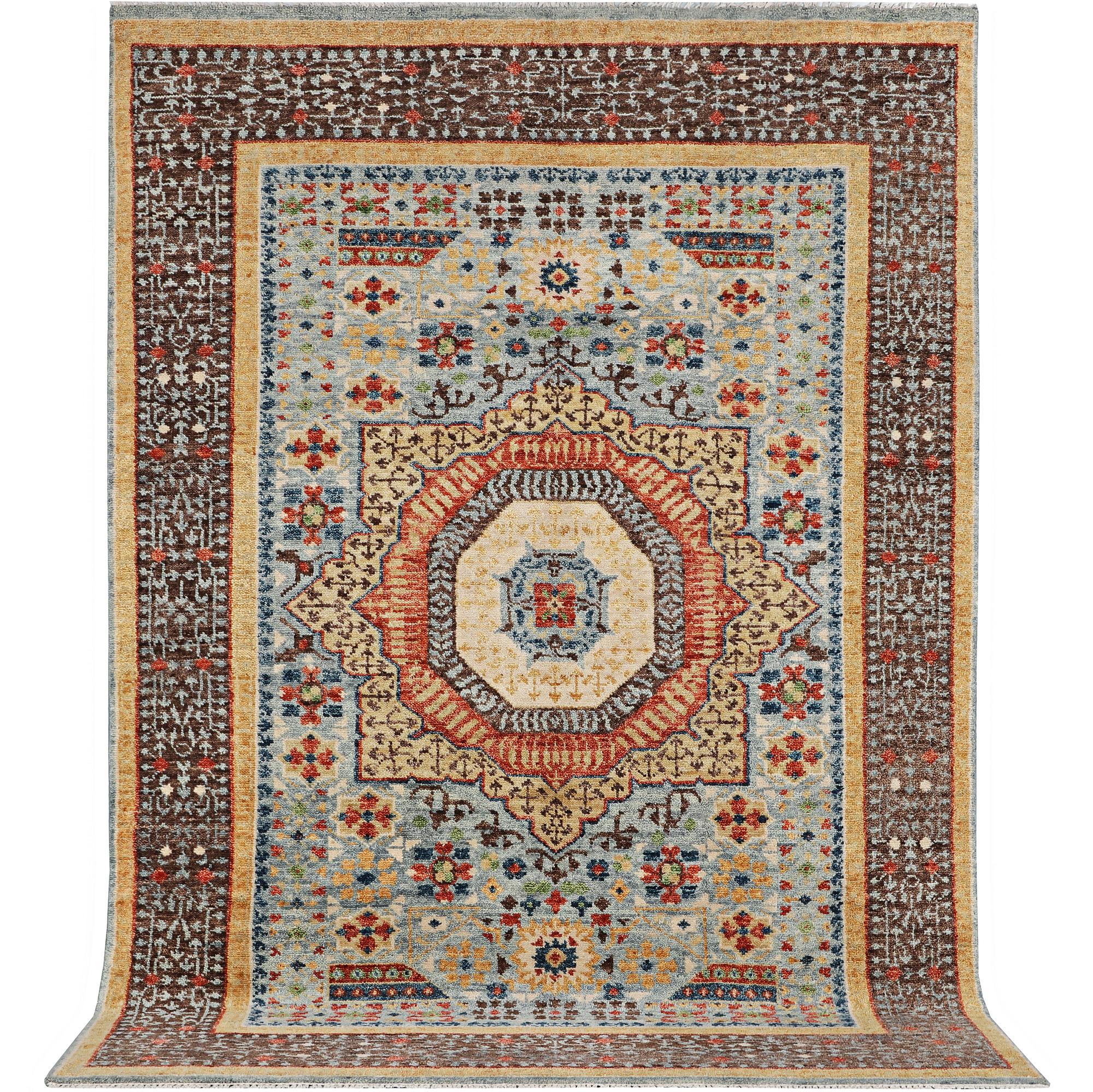 An oriental carpet with Mamluk design, c. 356 x 255 cm.