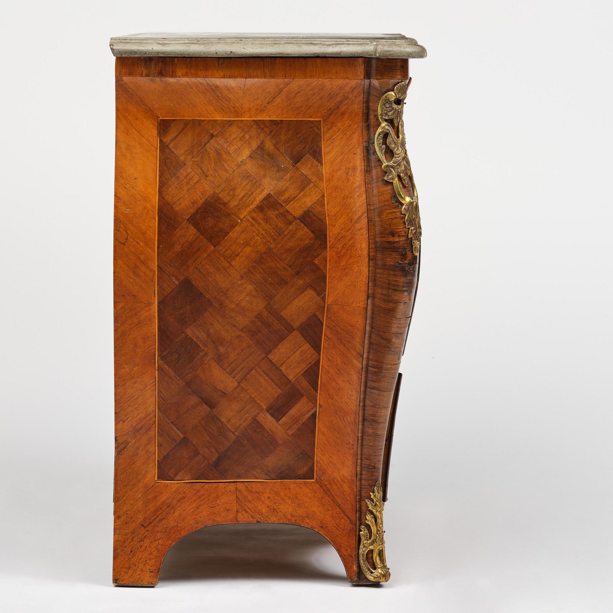 A rococo parquetry commode by C. Linning (master in Stockholm 1744-79).