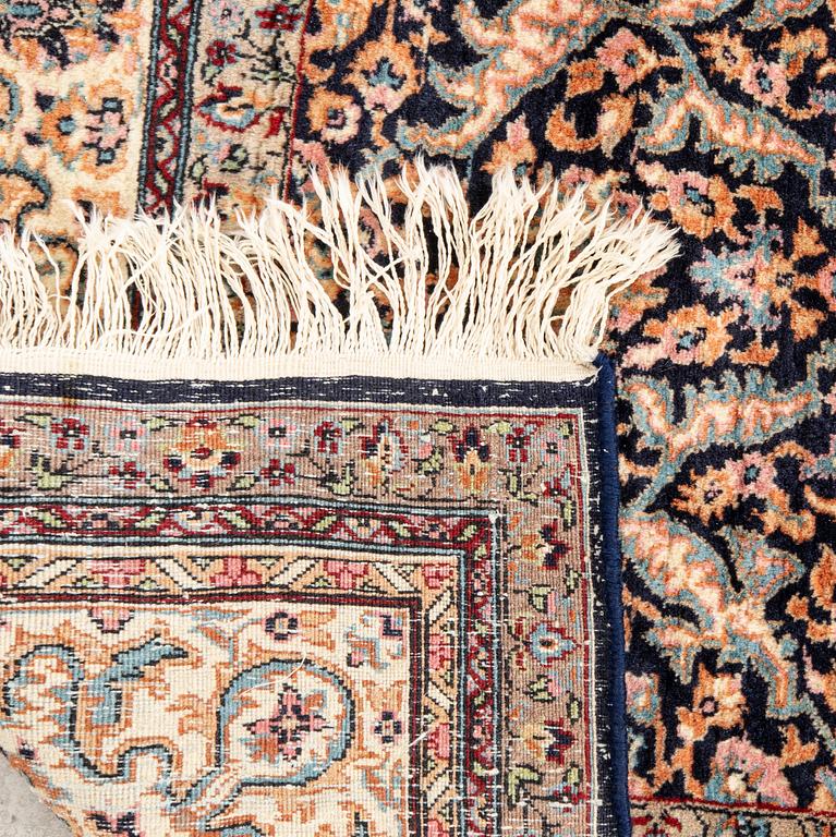 An old oriental carpet approx 214x143 cm.