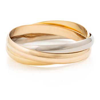 482. Cartier a bracelet "Trinity" 18K gold in three different colours.