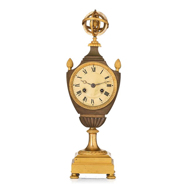 A French Empire ormolu and patinated bronze mantel clock, early 19th century,.