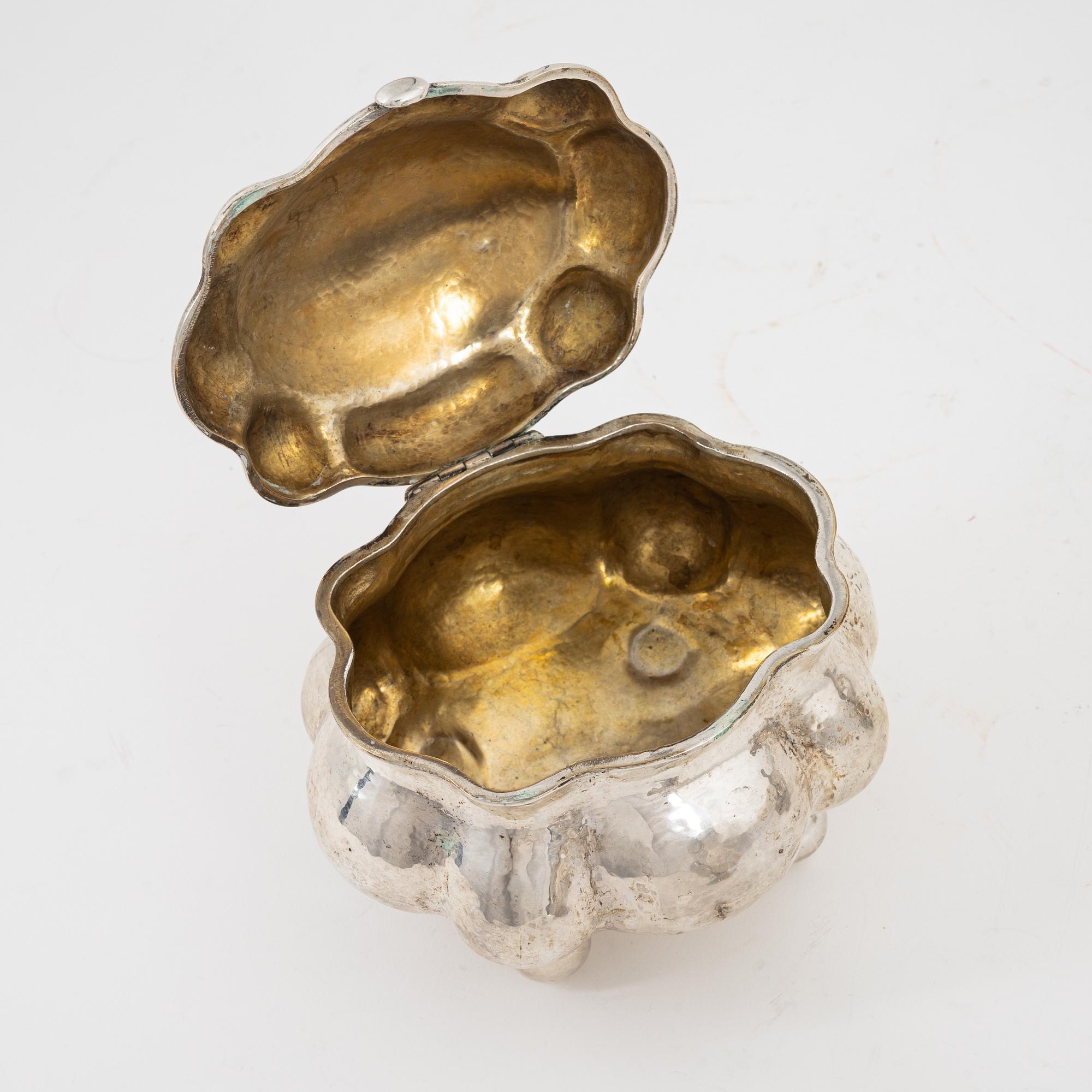 A Rococo style silver sugarbox and two creamers, including Lars Larsson ...