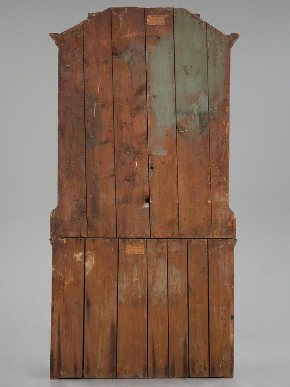 A Swedish polychrome-painted rococo cabinet, late 18th century.