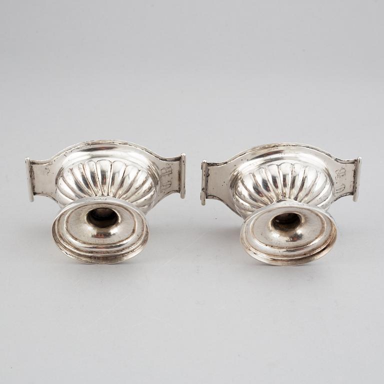 A pair of 19th century parcel-gilt silver salt-cellars, unidentified marks.