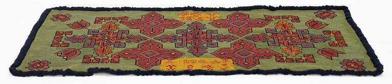 A carriage cushion, cross-stitch embroidered, Southwestern Scania, dated 1843.