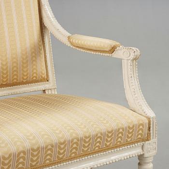 A pair of Gustavian late 18th century armchairs in the manner of Johan Lindgren.