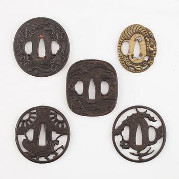 Five tsubas, iron and brass, Edo/Meiji period.