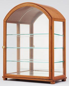 A Josef Frank mahogany showcase cabinet by Svenskt Tenn, model 2070.