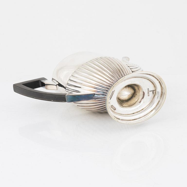 A three piece silver tea service, Birmingham, England, 1909.