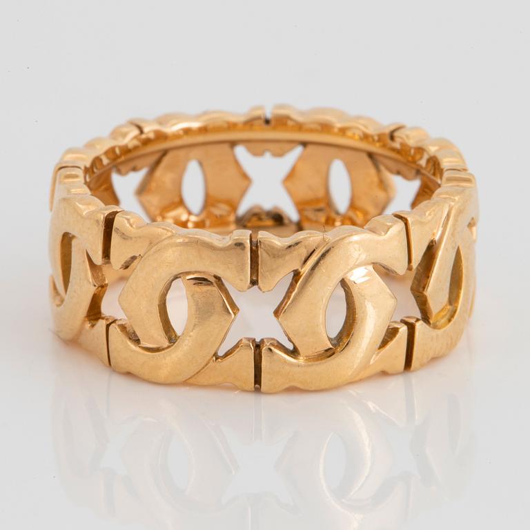 An 18K gold Cartier "Double C" ring.