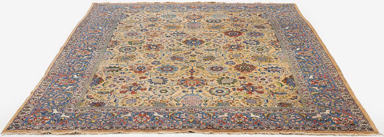 A semi-antique Tabriz carpet of vase design, West Persia, c. 404 x 292 cm.