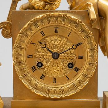 An Empire mantel clock, first half of the 19th century.