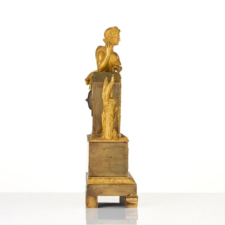 A French Empire ormolu and patinated bronze mantel clock, Paris, early 19th century.