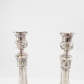 Candle holders, 2 pairs of silver-plated metal, first half of the 20th century.