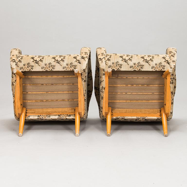 A pair of 1950s / 60s armchairs.
