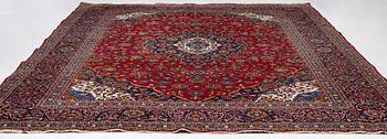 An Oriental carpet, c. 396 x 300 cm.