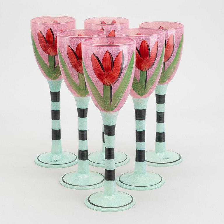 ULRICA HYDMAN-VALLIEN, a set of 12 wine glasses signed Kosta Boda late 20th century.