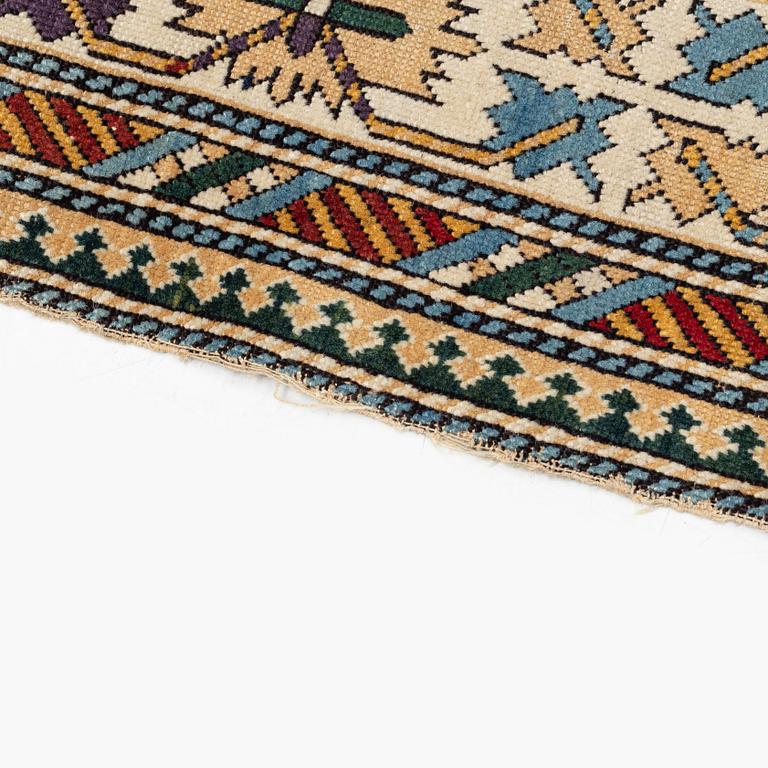 An antique Shirvan runner, circa 313 x 116 cm.