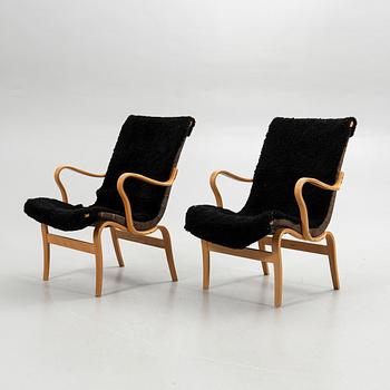 Bruno Mathsson, armchairs, a pair, "Eva", Bruno Mathsson International, Värnamo, second half of the 20th century.