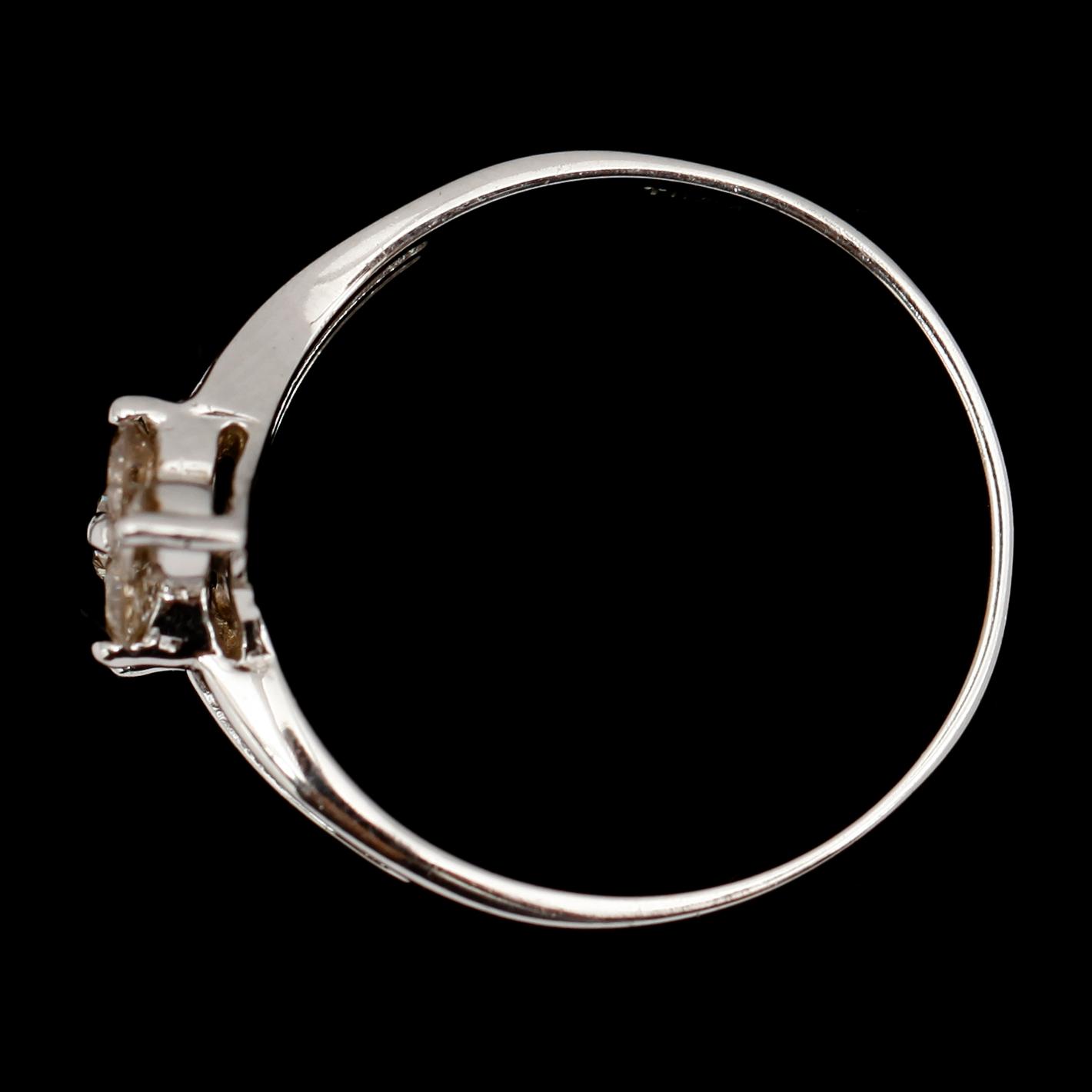 RING, 14 k vitguld, med briljanter tot  0.65 ct.