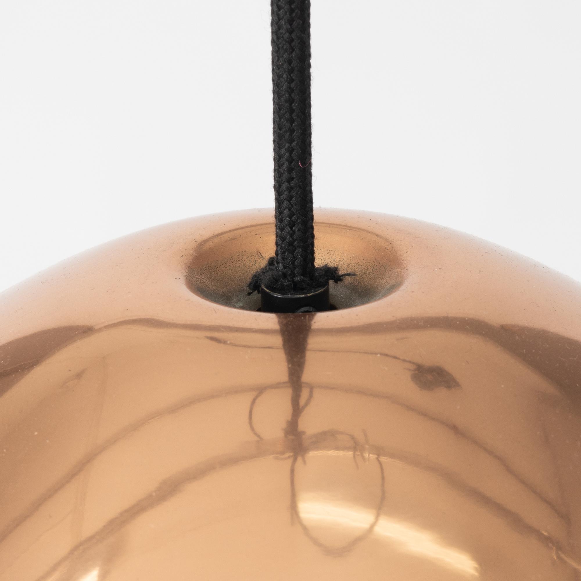 Tom Dixon, a 'Bell' ceiling lamp.