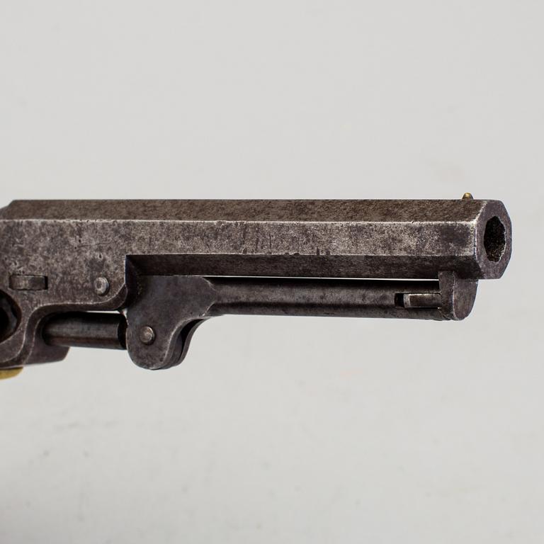 A Colt percussion revolver mid 19th century.