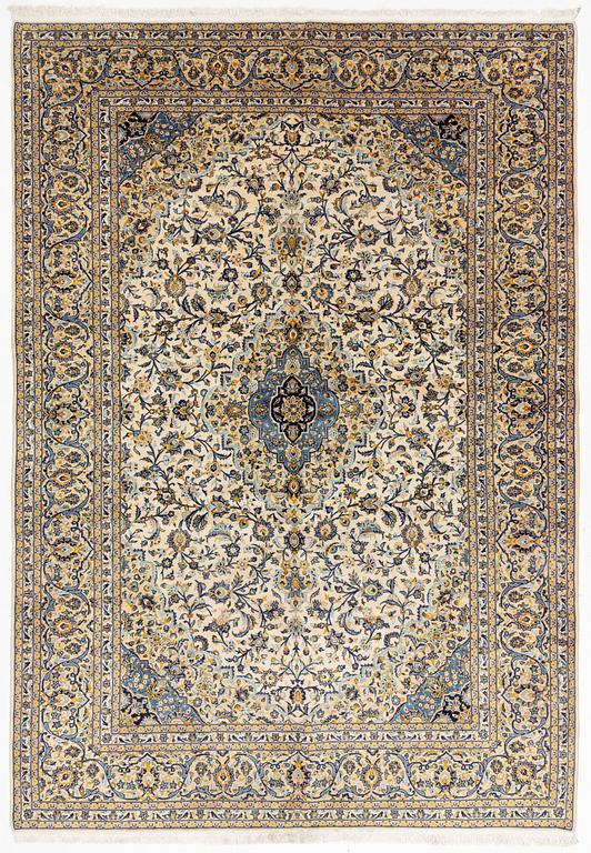A Kashan carpet, approximately 436 x 305 cm.