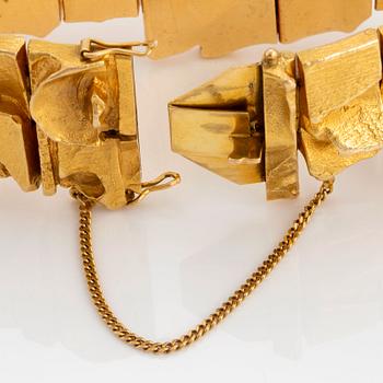 An 18K gold bracelet designed by Björn Weckström for Lapponia.